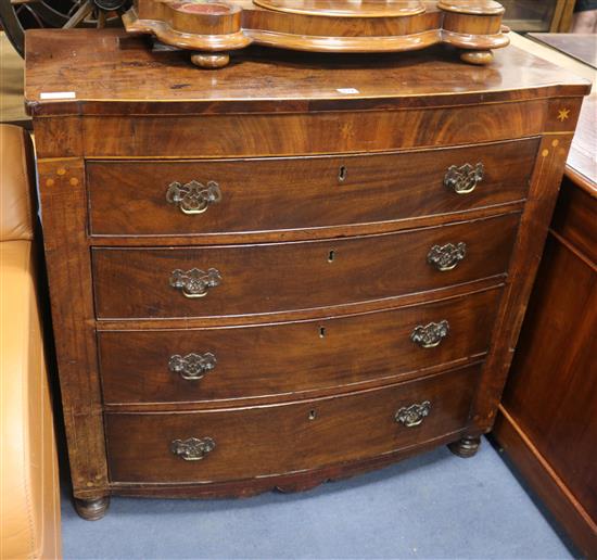 A Regency mahogany bowfront inlaid chest of drawers W.100cm